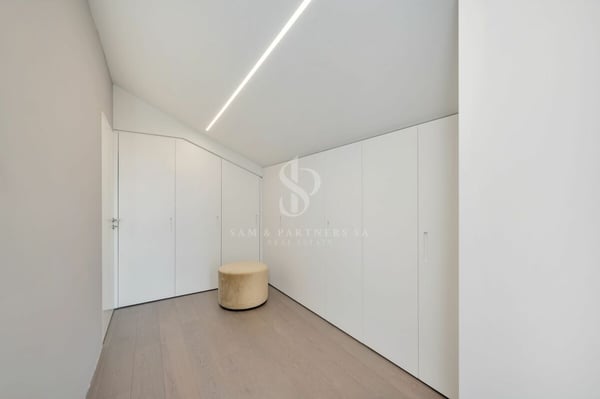 Attico duplex con vista lago 14