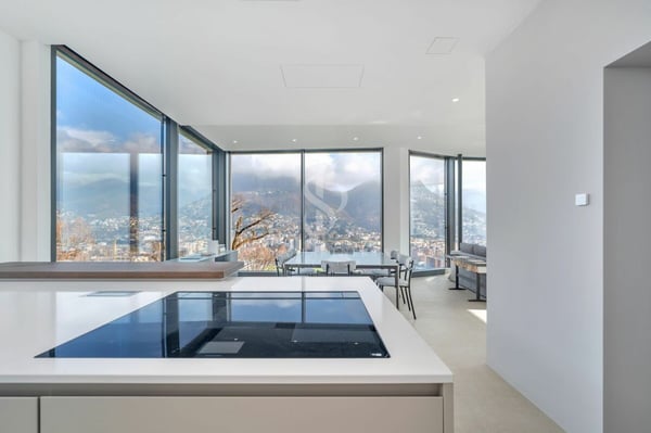 Attico duplex con vista lago 6
