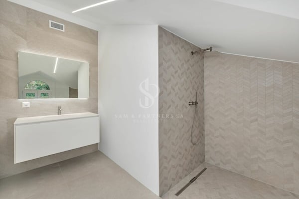 Attico duplex con vista lago 19