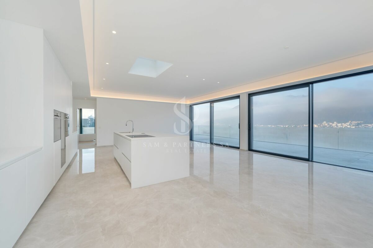 Attico con vista lago