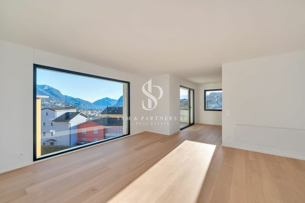 Attico con vista lago