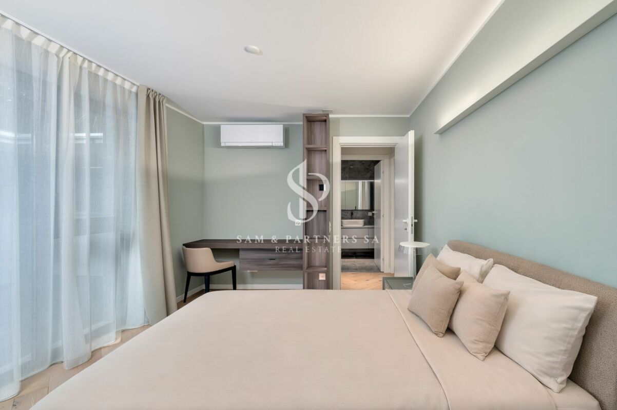 Penthouse con rooftop e vista lago