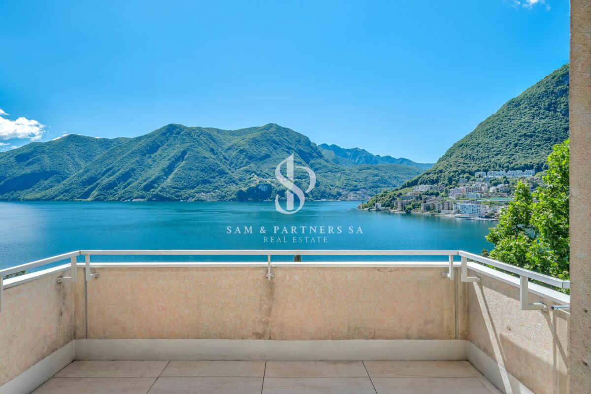 Attico con vista lago