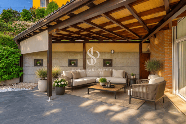 Villa contemporanea con giardino e potenziale di sviluppo 2