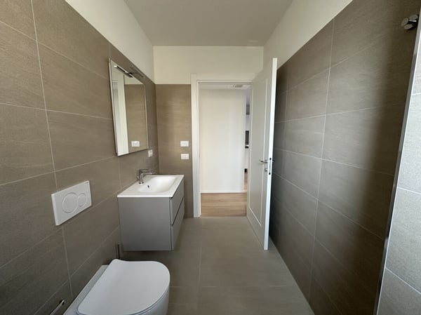 Moderno bilocale con grande giardino 9