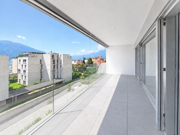 Moderne 3.5-Zimmer-Wohnung im Herzen von Minusio 1