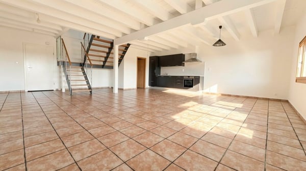 Duplex lumineux de 126 m² avec jardin commun dans un cadre verdoyant à Vuissens 2