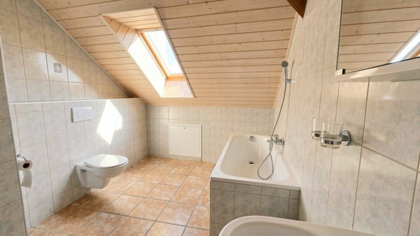 Duplex lumineux de 126 m² avec jardin commun dans un cadre verdoyant à Vuissens 7