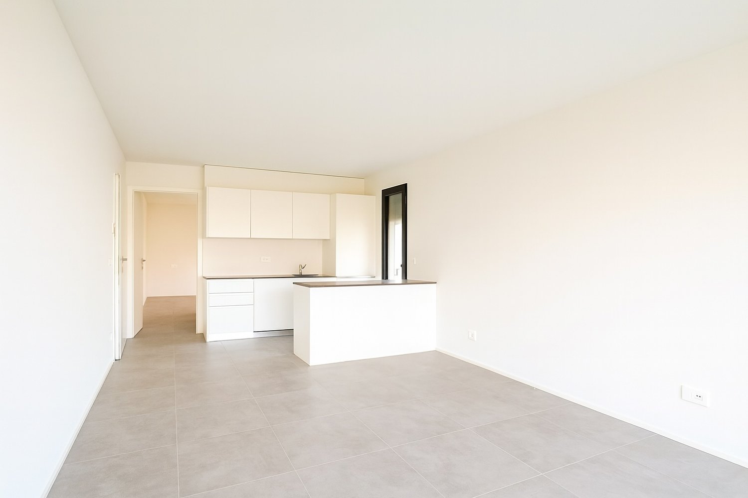 kitchen with countertop, cabinets, sink, faucet, and small balcony