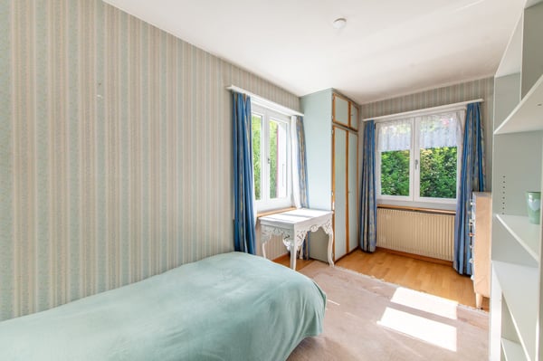 Zentrumsnahes Potenzial: Ausbaubares 5-Zimmer-Einfamilienhaus mit grosszügigem Garten 8