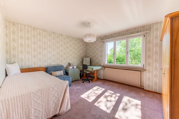 Zentrumsnahes Potenzial: Ausbaubares 5-Zimmer-Einfamilienhaus mit grosszügigem Garten 7