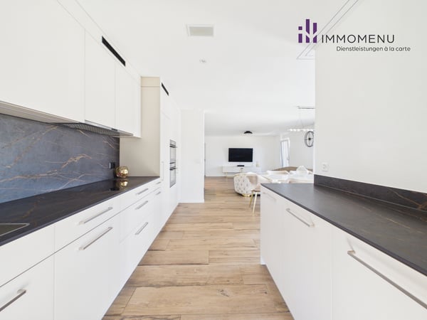 Moderne 4.5-Zimmer-Maisonettewohnung mit Süd-Garten und Bergsicht 2