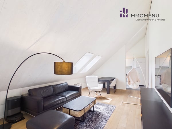 Moderne 2.5-Zimmer-Attikawohnung mit Weitsicht in Oberweningen 1