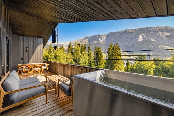Flims Waldhaus: modernes Wohnen mit Weitsicht und Ski-in 1