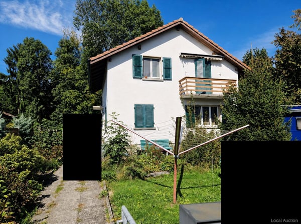 Wohnhaus mit Autounterstand 1