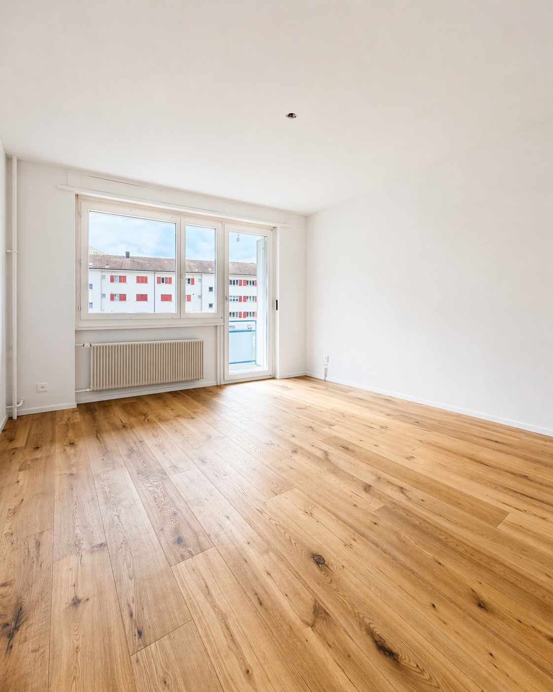 empty room, wooden floor, white walls, large window, balcony