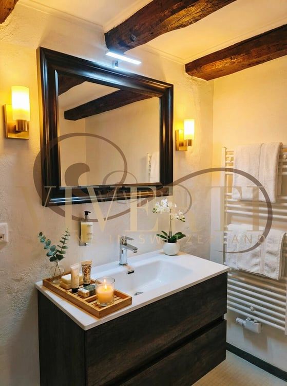 PALAZZINA CON 4 IMMOBILI A MORCOTE 8