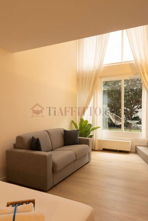 SPLENDIDO DUPLEX CON GIARDINO NEL CUORE DI LUGANO 13