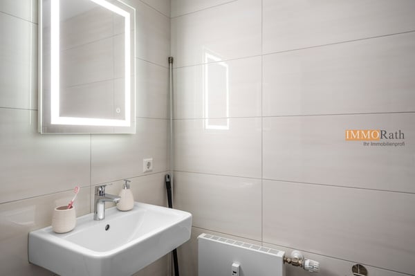 IMMORath.de - Sanierte Penthousewohnung mit Kamin und Dachterrasse 10