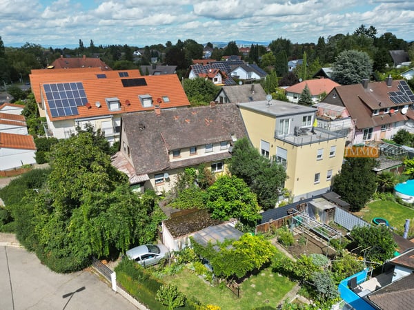 IMMORath.de - Zwei Wohnhäuser mit fünf Wohnungen und großzügigen Terra 1