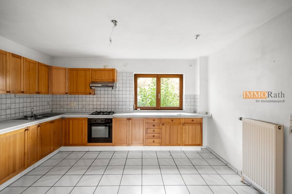 IMMORath.de - Gepflegtes Zuhause mit Doppelgarage und schönem Garten 10