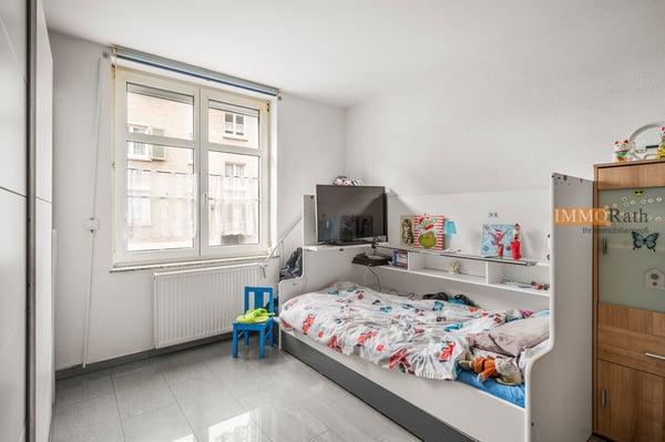 IMMORath.de - 4-Zimmerwohnung mit zwei Garagen 7
