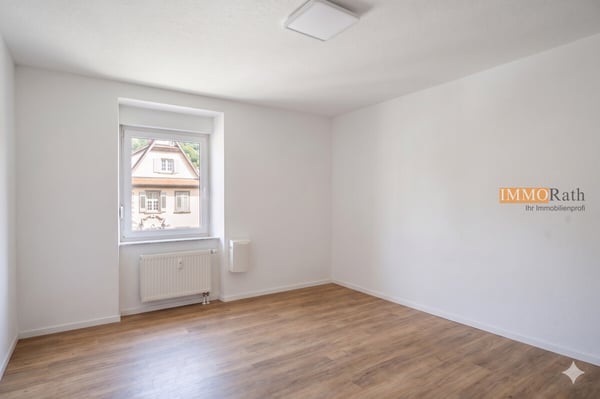 IMMORath.de - 4-Zimmer Wohnung mit Garten & Garage in Riegel 8