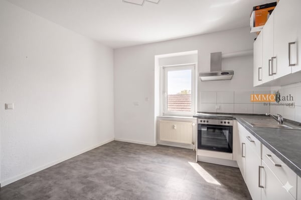 IMMORath.de - 4-Zimmer Wohnung mit Garten & Garage in Riegel 6
