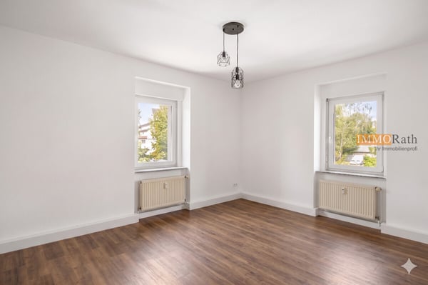 IMMORath.de - 4-Zimmer Wohnung mit Garten & Garage in Riegel 1