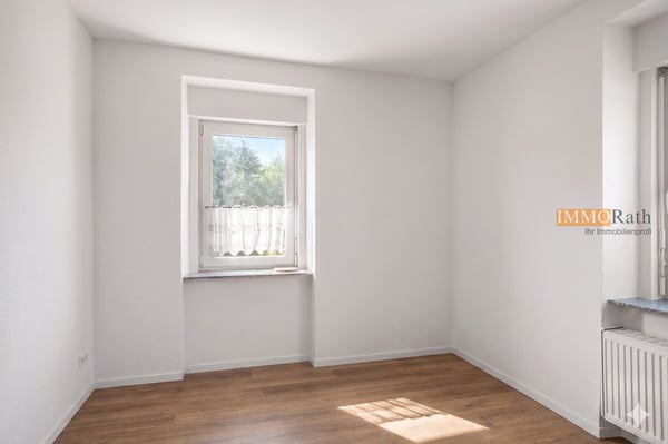 IMMORath.de - 4-Zimmer Wohnung mit Garten & Garage in Riegel 5