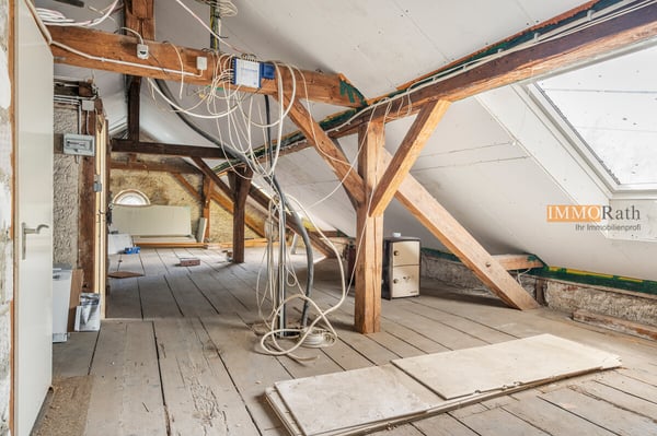 IMMORath.de - 4-Zimmer EG-Wohnung mit viel Freizeitfläche in Riegel 11