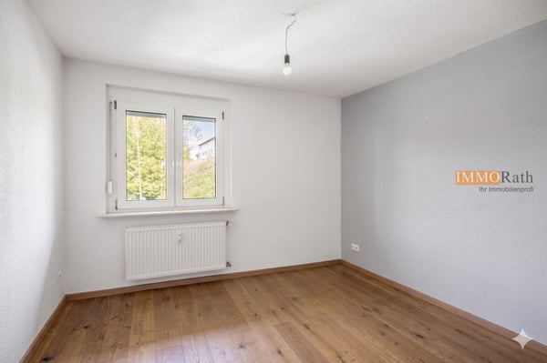 IMMORath.de - Energetisch saniertes Mehrfamilienhaus mit drei Wohneinh 6