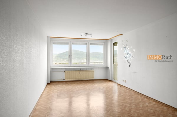 IMMORath.de - Zentrale 3-Zimmer-Wohnung mit großem Balkon 1