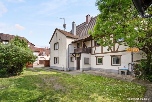 IMMORath.de - 5-Zimmer Doppelhaushälfte mit Innenhof