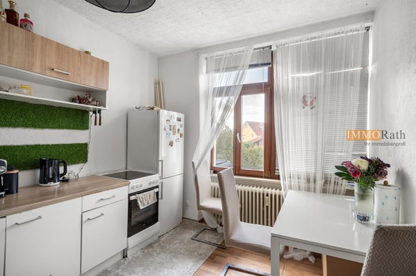 IMMORath.de - Großzügige 6-Zimmer-Wohnung mit zwei Stellplätzen in Ebr 8