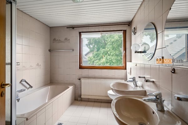 IMMORath.de - Doppelhaushälfte mit Einliegerwohnung und Garage 8