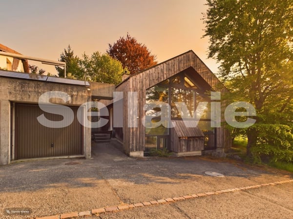 Exklusive Architekturperle in idyllischer Lage von Seewen! 1
