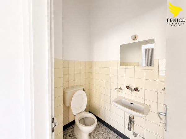 Spazio Commerciale in Vendita a Chiasso – 180 m² al Piano Terra 11