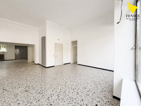Spazio Commerciale in Vendita a Chiasso – 180 m² al Piano Terra 9