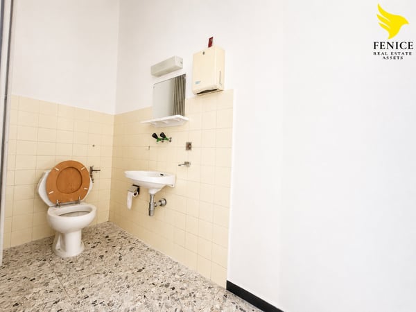 Spazio Commerciale in Vendita a Chiasso – 180 m² al Piano Terra 12