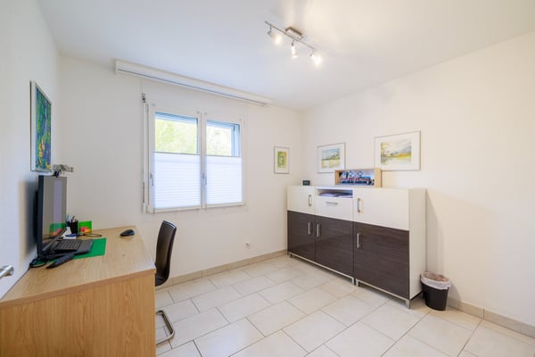 5.5-Zimmer-Familienhaus mit traumhaftem Garten und Aussicht ins Grüne 5