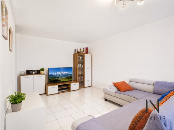 3,5 pièces avec jardin, balcon et 2 places de parc 7