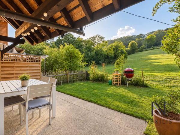 3,5 pièces avec jardin, balcon et 2 places de parc