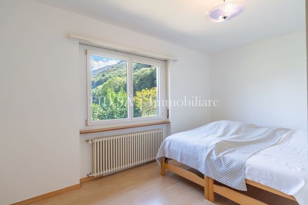 CONTONE - Einfamilienhaus inmitten von viel Grün mit grossem Grundstück 7