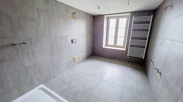 Propriété en duplex 1.5 pces d'env. 190 m2 avec jardin à Seiry / FR 12