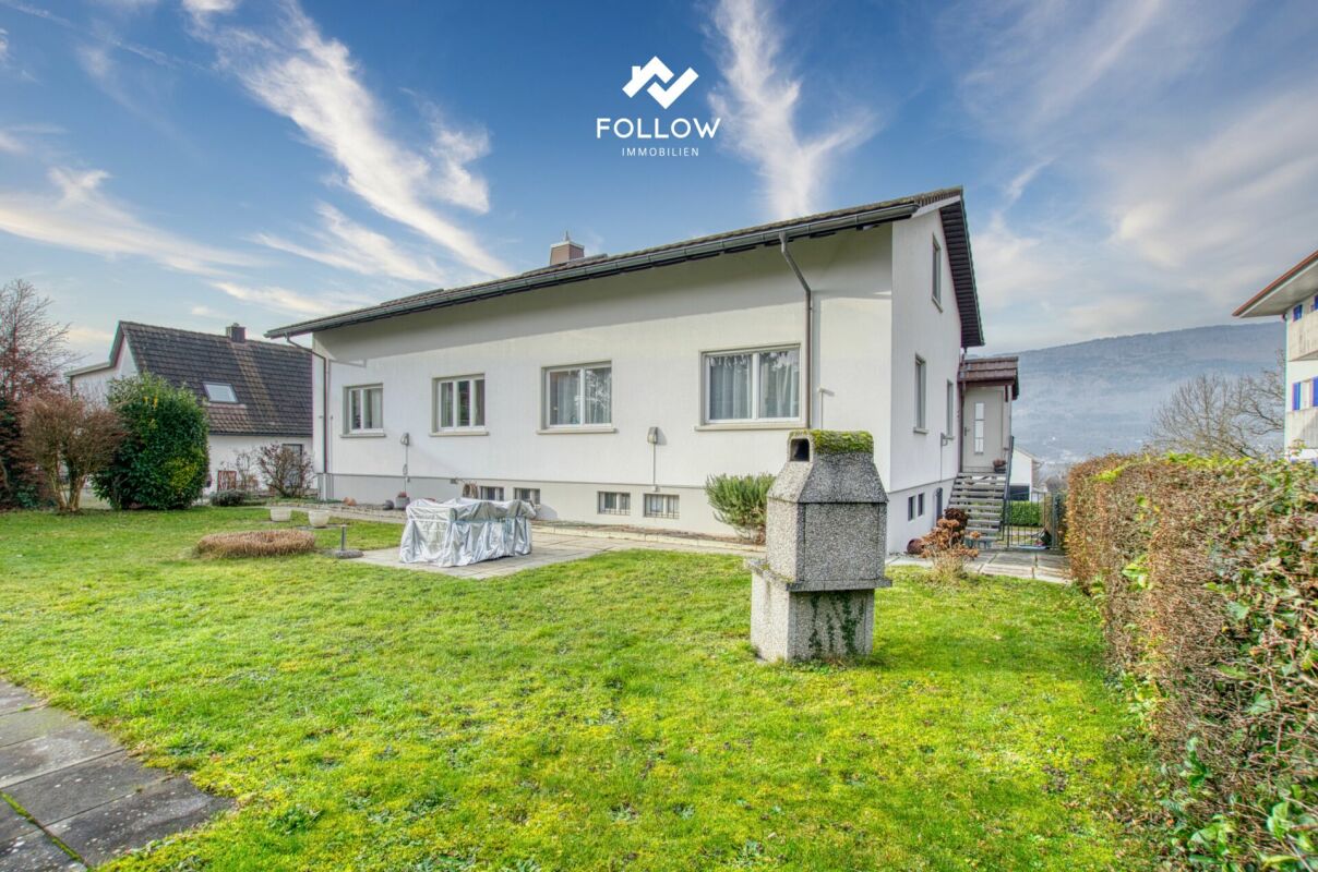 Appartamento con vista sul lago e giardino privato