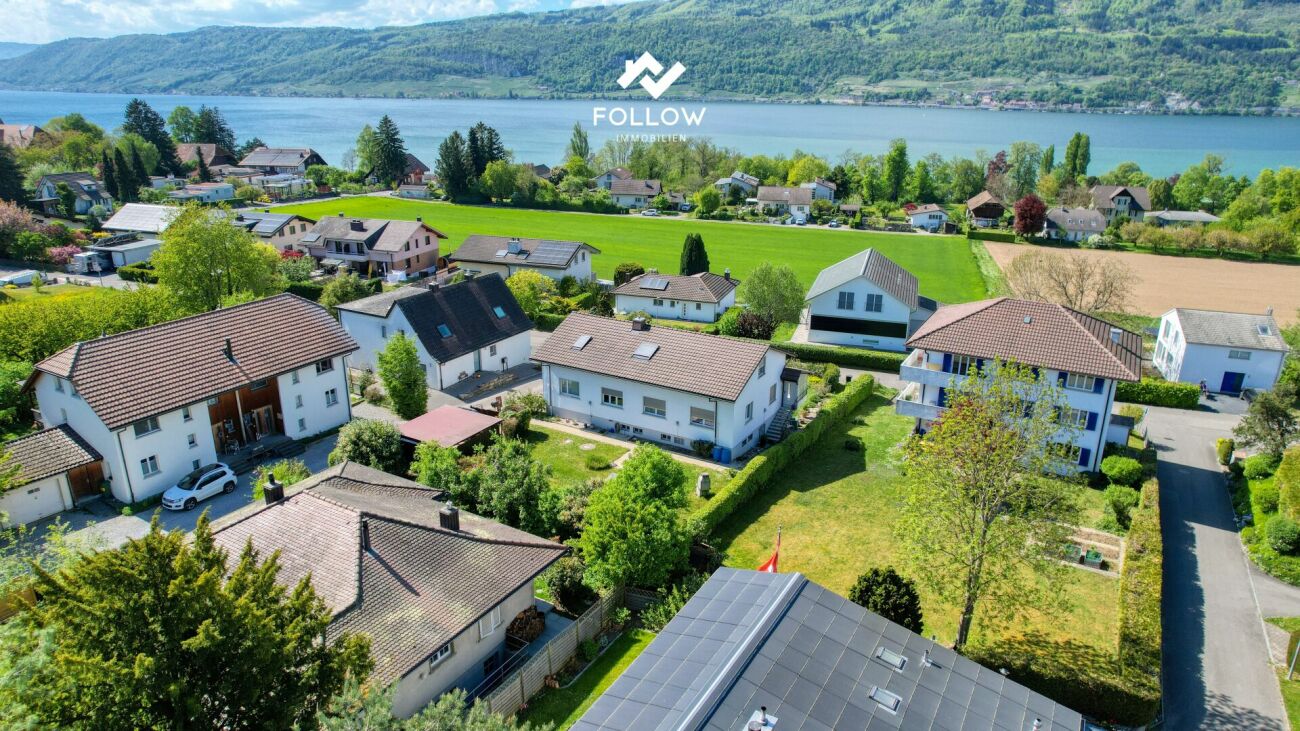 Appartamento con vista sul lago e giardino privato