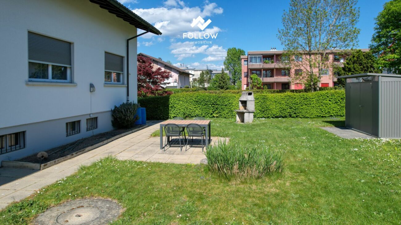 Appartamento con vista sul lago e giardino privato