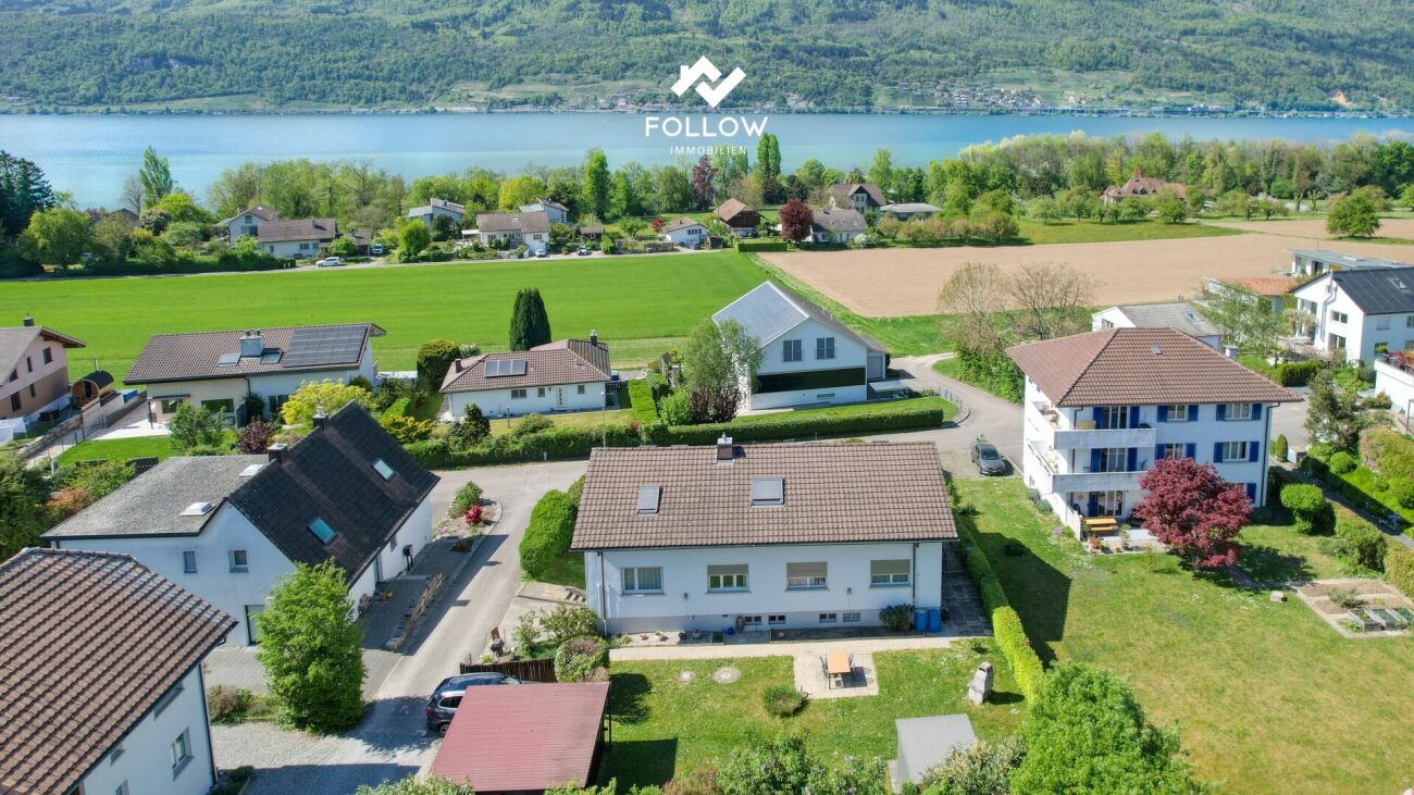 Appartamento con vista sul lago e giardino privato