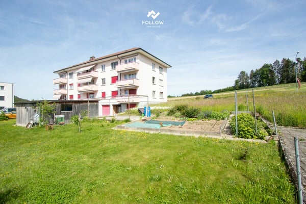 Mehrfamilienhaus mit Entwicklungspotenzial und zusätzlicher Bauparzelle in Heitenried 1